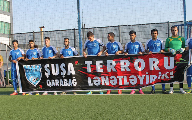 Azərbaycanlı futbolçular terror qurbanlarını yad etdi - Foto